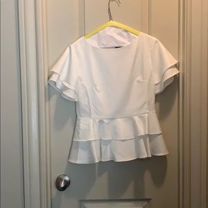 Peplum top with bell sleeve